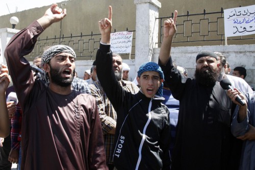 Members of Islamist Salafi in Jordan protest to demand the release of their members held in Jordanian prisons in Amman
